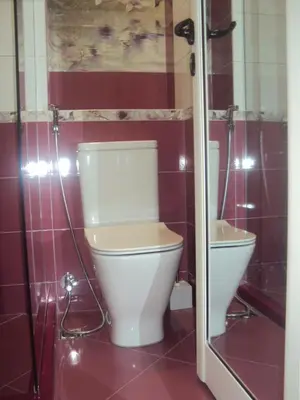 a bathroom with a toilet and a sink at Apartment 13 in Sofia