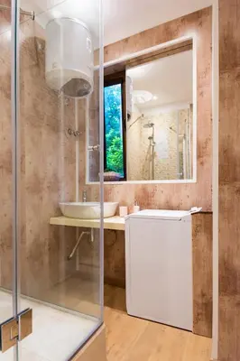 a bathroom with a sink and a mirror at Stylish and cosy Gem, top center! in Sofia