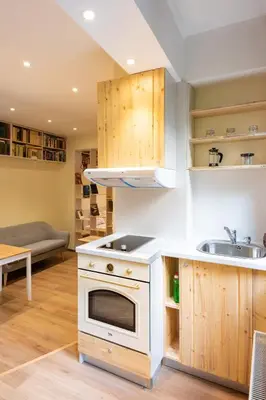 a kitchen with a sink and a stove at Stylish and cosy Gem, top center! in Sofia