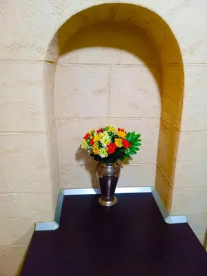 a vase filled with flowers sitting on a table at Apartment Lion's bridge 1 - Top Center in Sofia