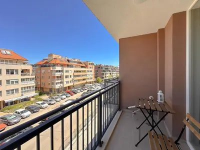 a balcony with a view of a street with cars at Crème Lux - Elegant 1BD in Manastirski Livadi by Flat Manager in Sofia