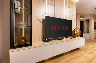 a television sitting on a shelf in a room at TOP Center apt 'Pemena' FREE Private Parking in Plovdiv
