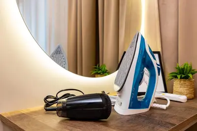 a desk with a computer monitor on top of it at 1BR Modern and Cozy Apartment with Free Street Parking in Plovdiv
