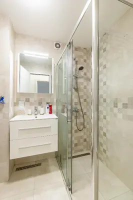 a bathroom with a shower and a sink at Finest 3BR Downtown in Sofia