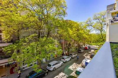 an aerial view of a city street with cars parked at Stylish apt 'Photo Booth' with an amazing location in Plovdiv