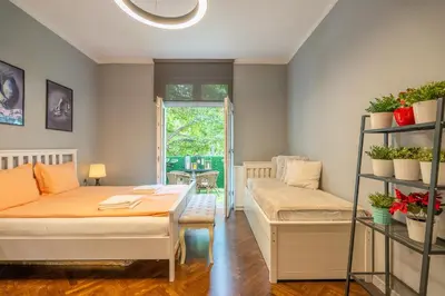 a room with a bed and a couch at VIP APARTMENT ViTOSHA 69 blvd 3 bdrm - TOP LOCATION in Sofia