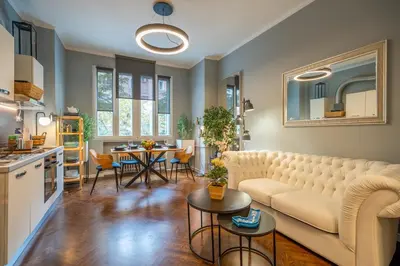a living room with a couch and a table at VIP APARTMENT ViTOSHA 69 blvd 3 bdrm - TOP LOCATION in Sofia