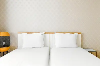 two beds sitting next to each other in a room at Classic Charm - 2BD central Apartment by FlatManager in Sofia