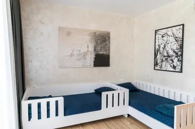 a bedroom with two beds in a room at Business Park Premium, 2B lux flat, free garage in Sofia