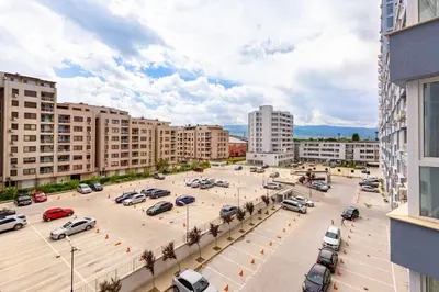an aerial view of a parking lot in a city at 1BR Apartment with a Free Designated Parking Space in Plovdiv