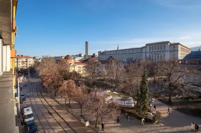 a view of a city with trees and buildings at Roca House in Sofia