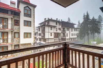 a view from a balcony of buildings at Dream View 1BD - Quick Slope Access by Flat Manager in Pamporovo