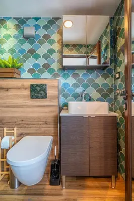a bathroom with a toilet and a sink at Leafy Loft in Sofia