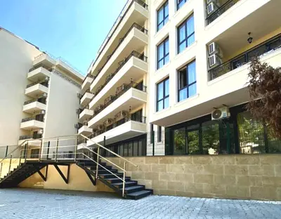 a building with a staircase in front of it at Hotel Rooms St Paul in Plovdiv