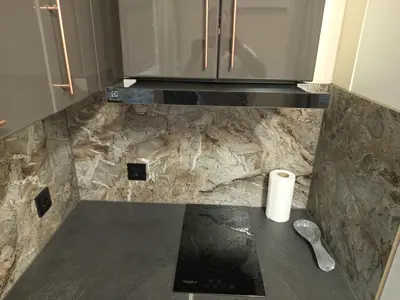 a kitchen counter with a roll of toilet paper on it at Самостоятелен Apartment Emili in Sapareva Banya