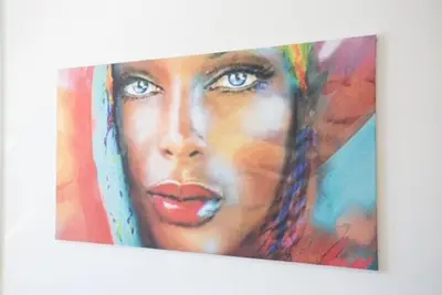 a painting of a black woman with at Mountain view apartment in Aspen Golf Resort with SPA in Bansko