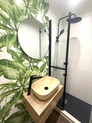 a bathroom with a sink and a mirror at Luxury apartment in the heart of Sofia in Sofia
