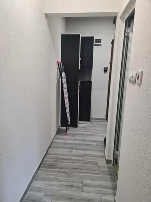 a hallway of an office building with a hallway at Cosmopolitan in Devin
