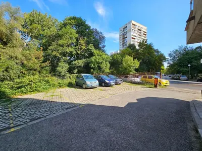 a group of cars parked in a parking lot at Rea Flora - Cozy Stay With Free Parking in Sofia