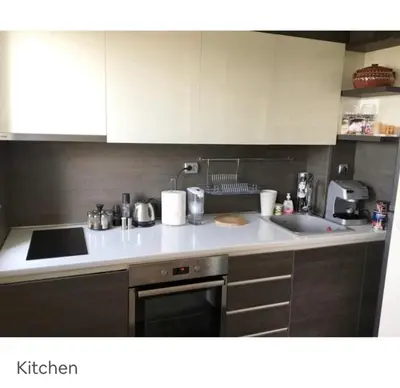 a kitchen with a sink and a counter top at Premium High Rise, Gorgeous City Views in Plovdiv