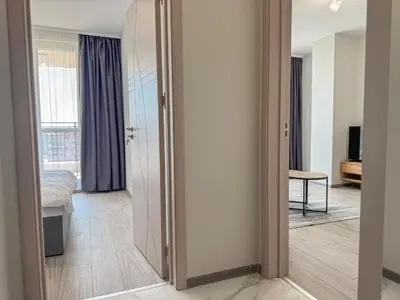 a room with a door leading to a bedroom at 1BR Apartment with Panoramic View Balcony and Designated Parking Space in Plovdiv