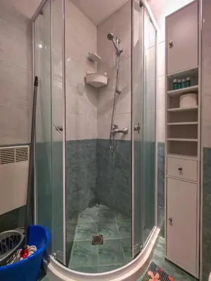 a shower with a glass door in a bathroom at Cozy 1BD Flat in Pirin Sense by Flat Manager in Bansko