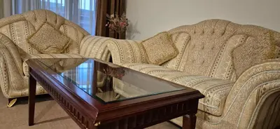 a living room with a couch and a coffee table at Gondola luxury apartment 2 in Bansko