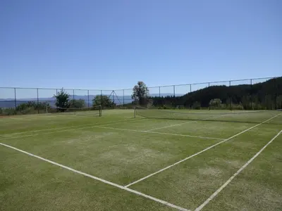 a tennis court with a net on top of it at 19 Rose in Bansko