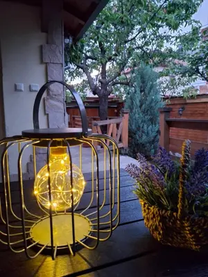 a light that is sitting on a patio at The Old Cherry House in Razlog