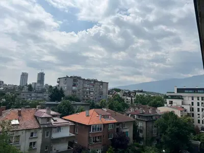 a view of a city with buildings and trees at South Park in Sofia