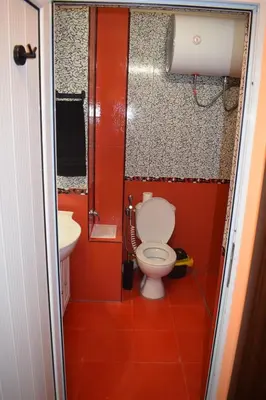 a bathroom with a toilet and a sink at Pirin 7 in Pazardzhik