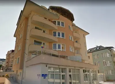 a tall building with balconies on the side of it at Bright and spacious apartment with panoramic views in Sofia