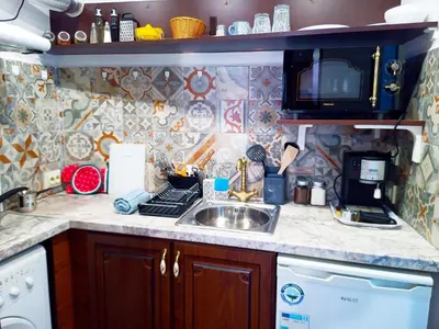 a kitchen counter with a sink and a microwave at Jazzy Art Home - Top Center - plus Free Vouchers in Sofia