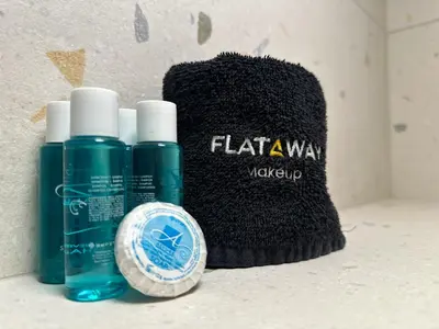 a close up of two bottles of hair products and a hat at Scandinavian Charm - Central 1BD with Desk by Flat Manager in Sofia