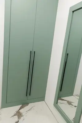 a pair of mirrors in a room with marble floors at Stay Point One Bedroom Apartment Including Underground Parking Place in Sofia
