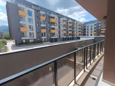 an apartment balcony with a view of buildings at Green Apart Residence Including Parking Place in Sofia