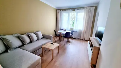 a living room with a couch and a table at No X - Sofia top center in Sofia