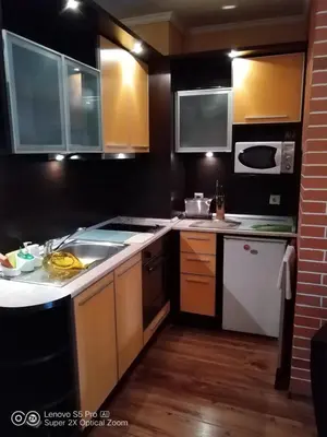 a kitchen with a sink and a stove at Stay with Me Women only room parking childrens pets welcom in Sofia
