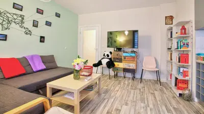 a living room with a couch and a table at City Nest 1BD in Lozenets by Flat Mаnager in Sofia
