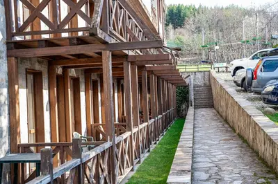 a building being constructed with wooden beams on it at Green Life Cozy Studio Bansko in Bansko