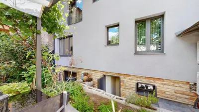 an exterior view of a building with windows at Cozy 1BR Flat next to NDK with Private Patio in Sofia