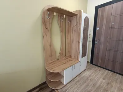 a wooden mirror on a wall in a room at Ishirkov Residence Studio 2 in Sofia