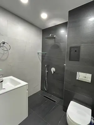 a bathroom with a shower with a toilet and a sink at Rea Silena - Modern and Stylish Studio in Sofia
