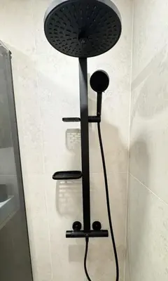 a shower head in the corner of a bathroom at Cosy & Modern 1BD Flat close to NDK by Flat Mаnager in Sofia