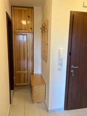 a room with a door and a box next to a hallway at Borovets Gardens apartment C-43 in Borovets