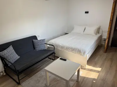 a small room with a bed and a chair at Cozy Home in Ardino 2 in Ardino