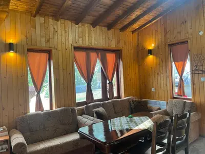 a living room with a couch and a table at Studio Elias in Zlatograd