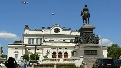 a large white building with a statue in front of it at Designer 2BD Apt Near Alexander Nevski Cathedral by Flat Mаnager in Sofia