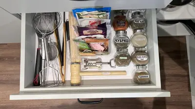 a refrigerator filled with different types of kitchen utensils at 3 Спални - Електрическо Подово Отопление - Бърз WiFi - Веранда - В Гората - Warm Forest Nest Pamporovo in Pamporovo