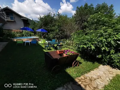 a backyard with a ping pong table and a picnic table at Villa Aqua in Pravets